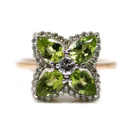 18kte White gold and pink gold ring with brilliants and peridots